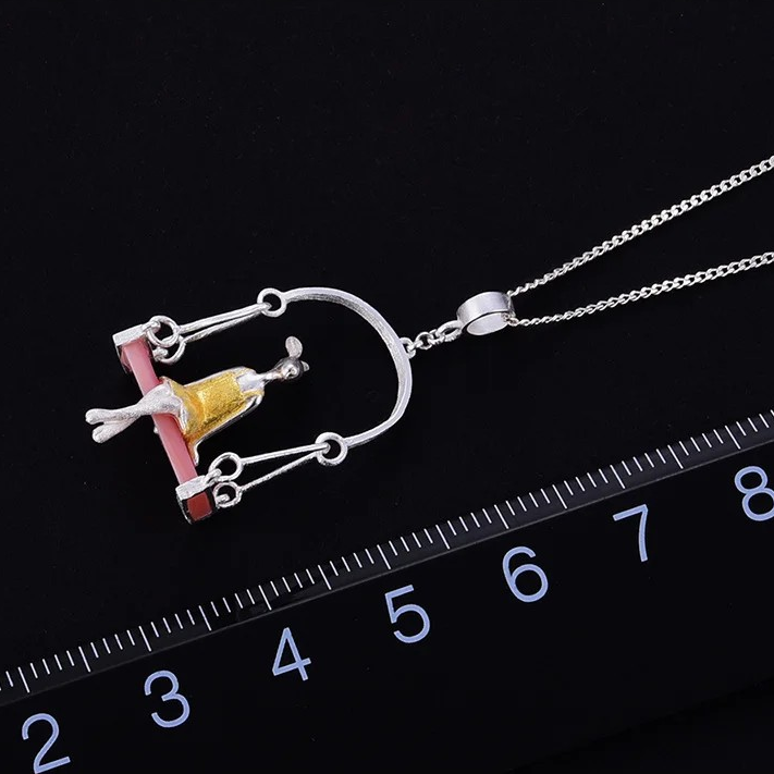 Handgefertigte Halskette "Hase auf Schaukel", 925er Silber, Shell