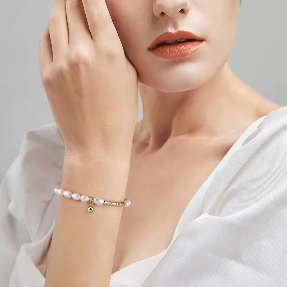 Perlenarmband mit Kügelchen Anhänger