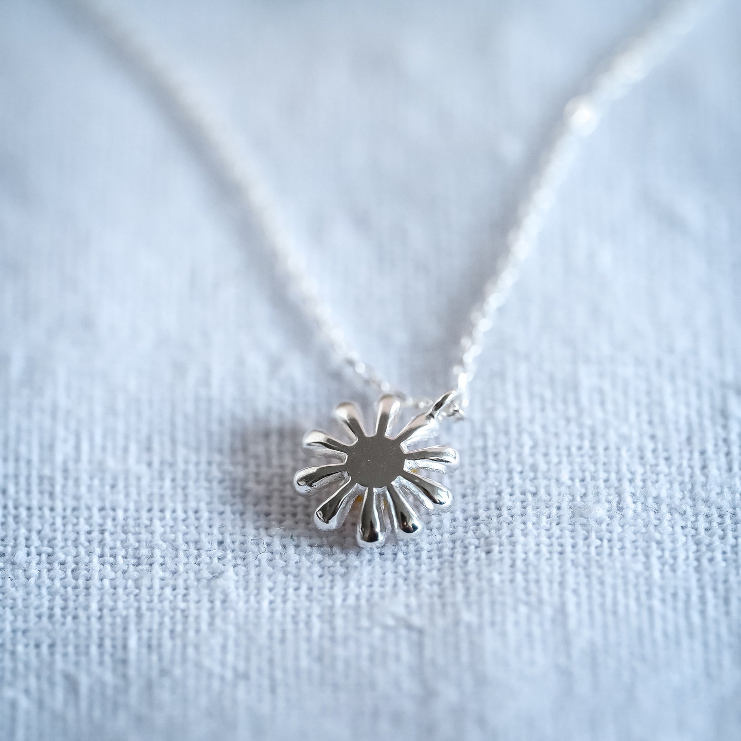 Delicate necklace with small daisy pendant, 925 silver