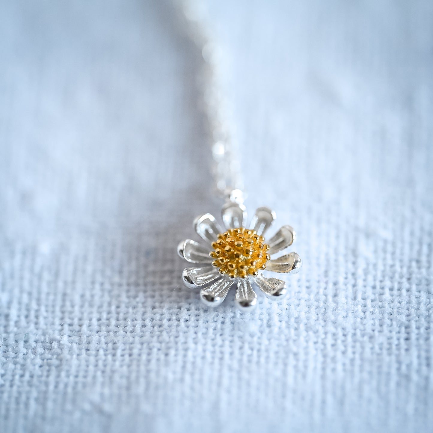 Delicate necklace with small daisy pendant, 925 silver