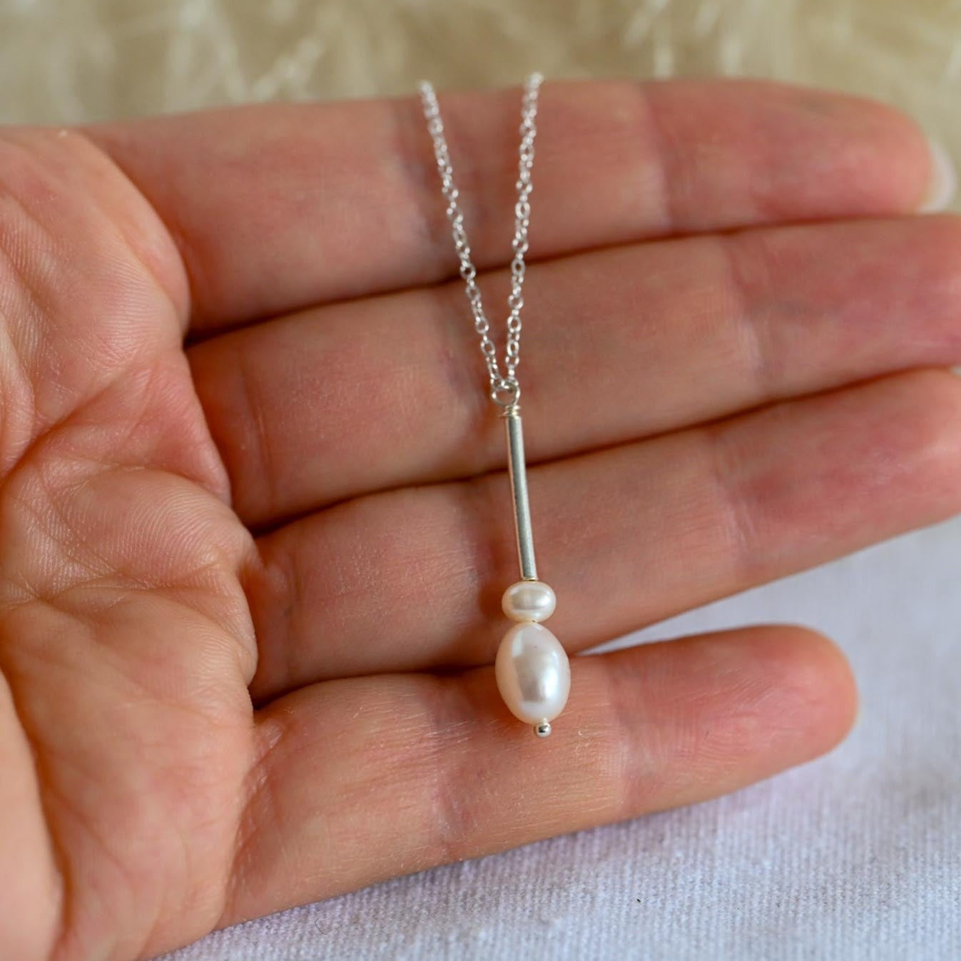 Delicate minimalist pearl necklace made of 925 sterling silver with freshwater pearls