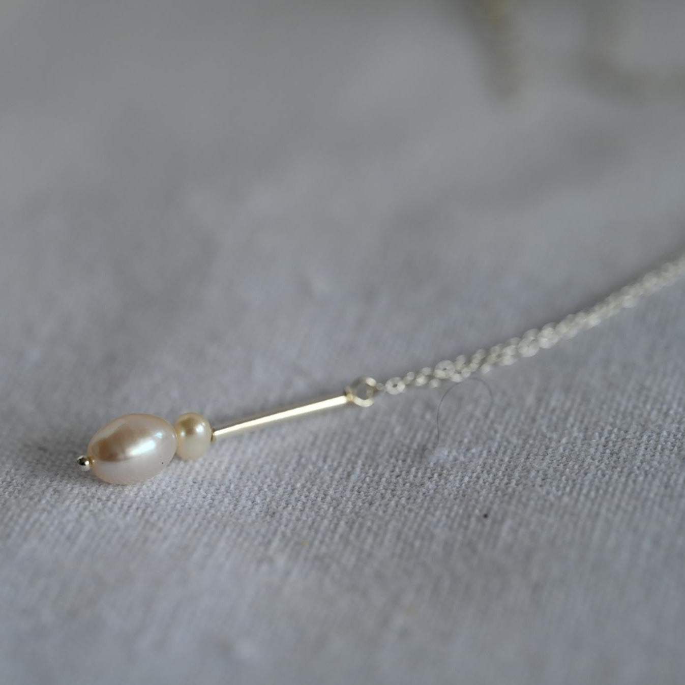Delicate minimalist pearl necklace made of 925 sterling silver with freshwater pearls