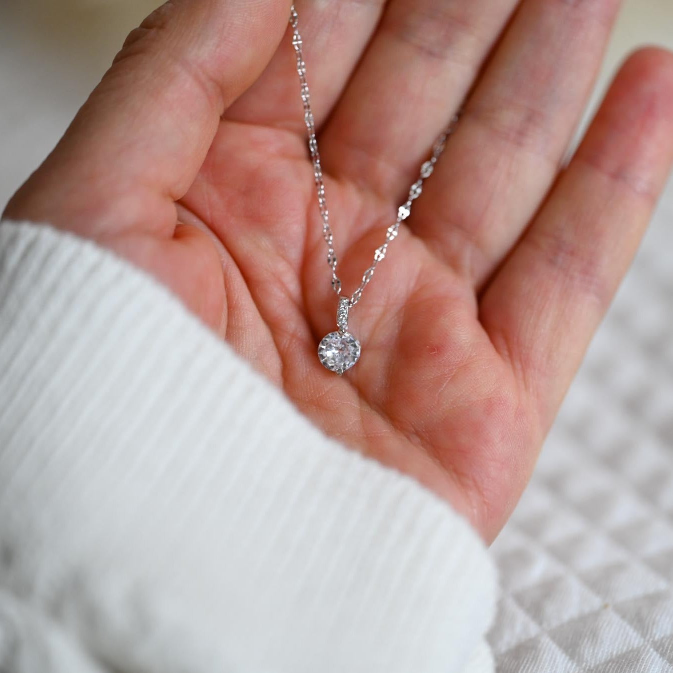 Elegant delicate necklace with zircon pendant