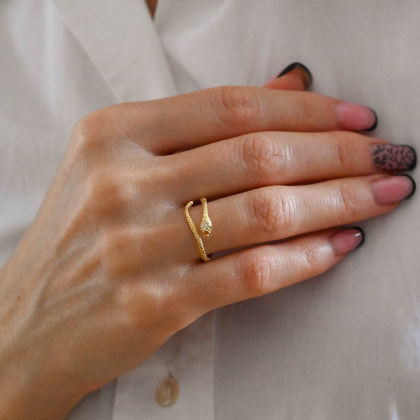 Adjustable ring "Snake with green eyes"