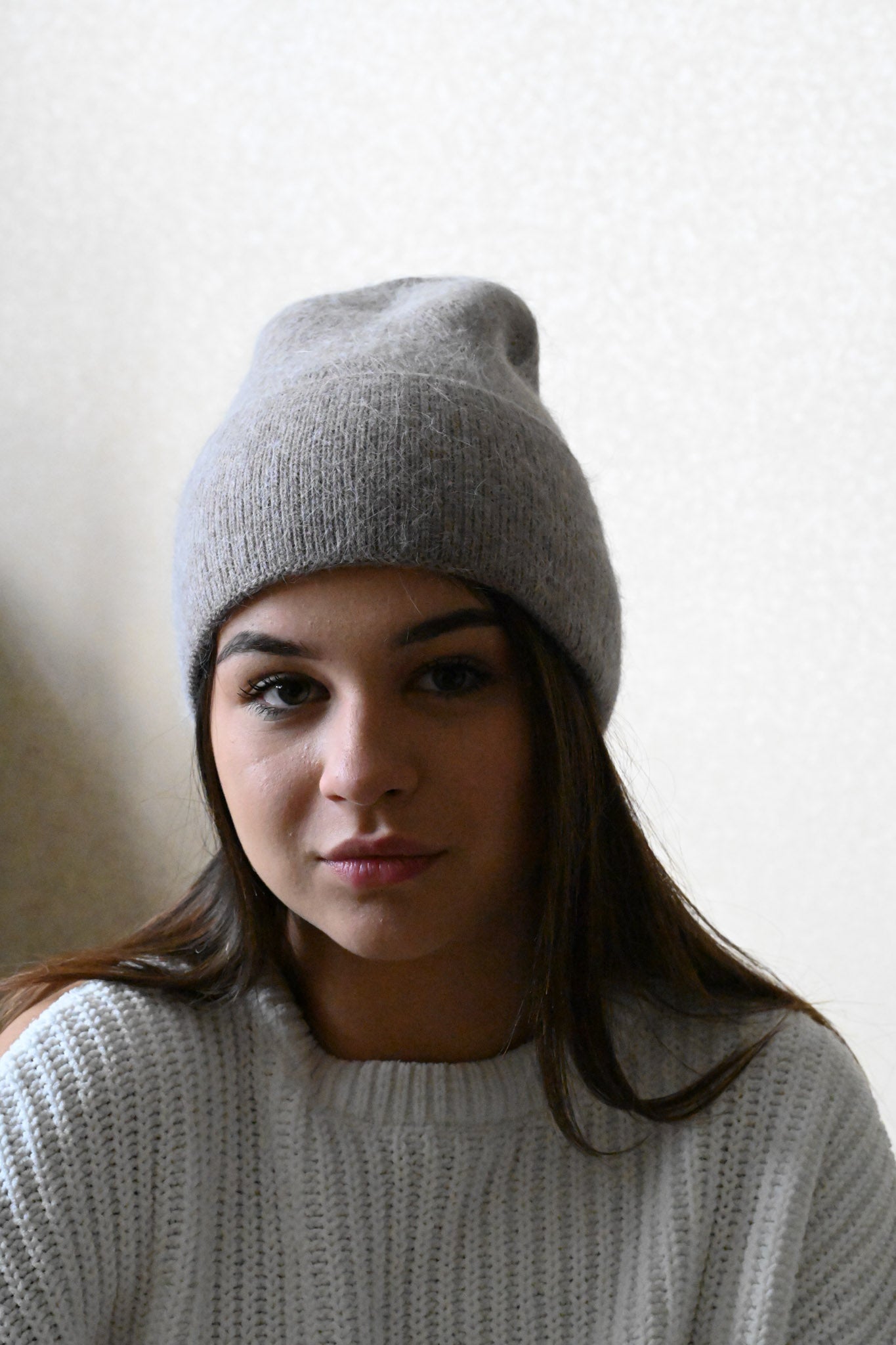 Warm, soft and fluffy hat made of merino wool and angora wool, cappuccino