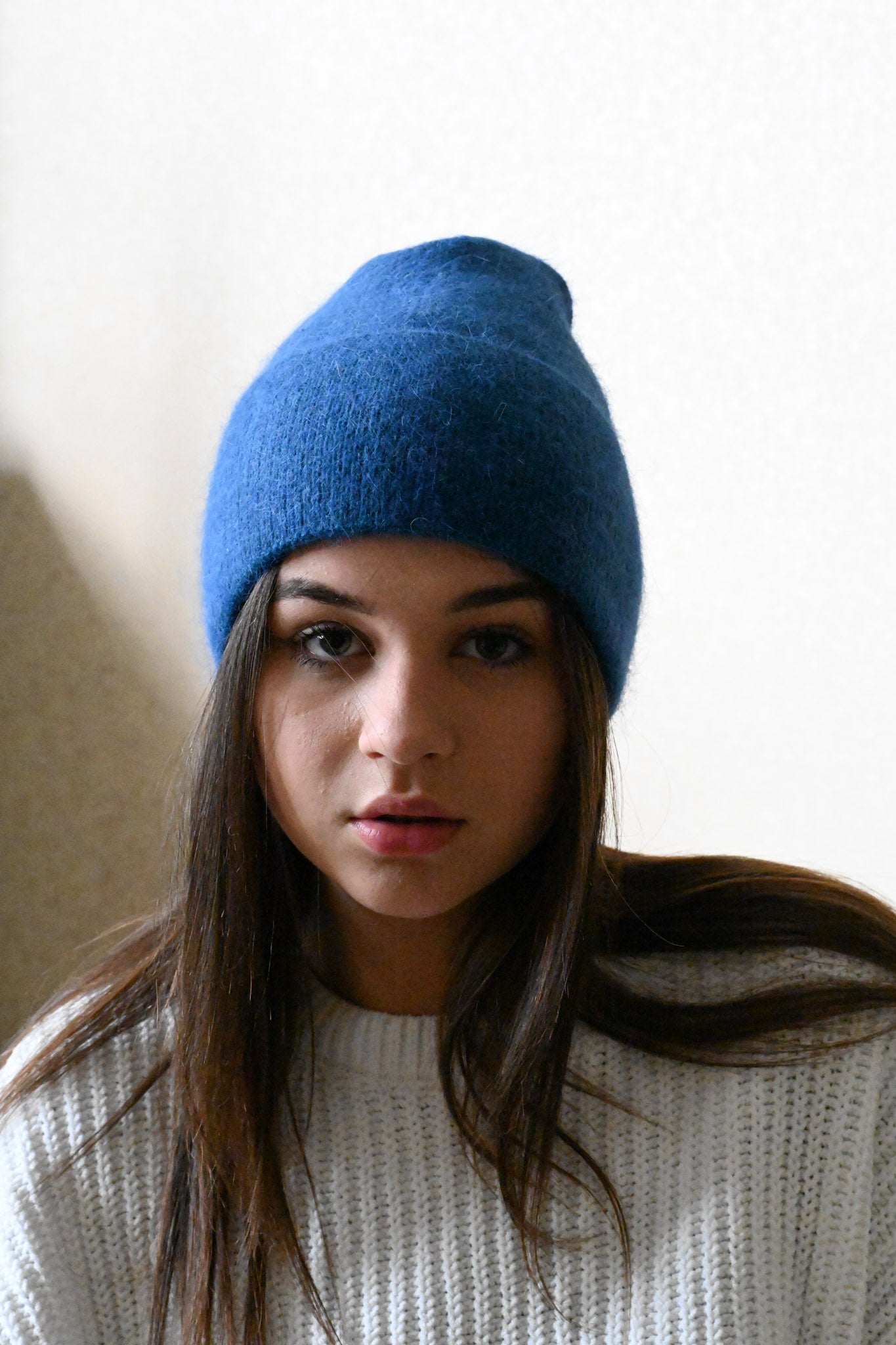 Warm, soft and fluffy hat made of merino wool and angora wool, blue