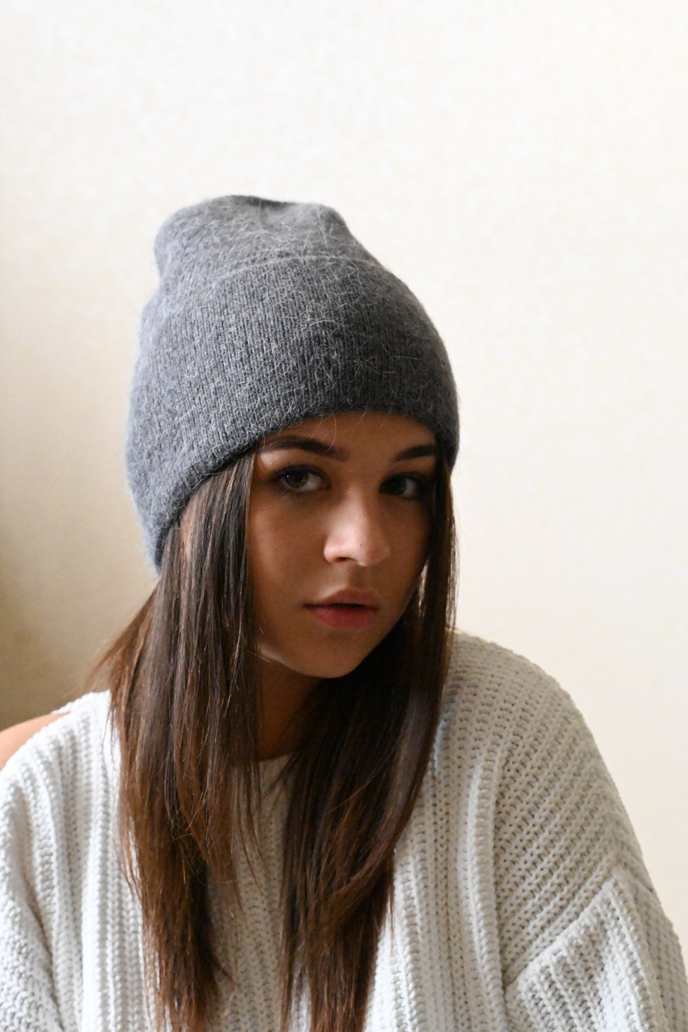 Warm, soft and fluffy hat made of merino wool and angora wool, dark grey