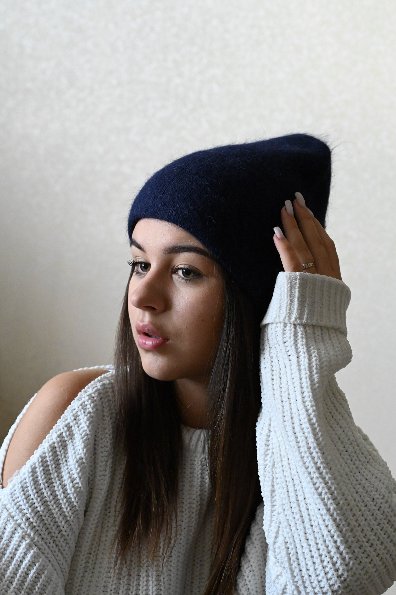 Warm, soft and fluffy hat made of merino wool and angora wool, navy blue