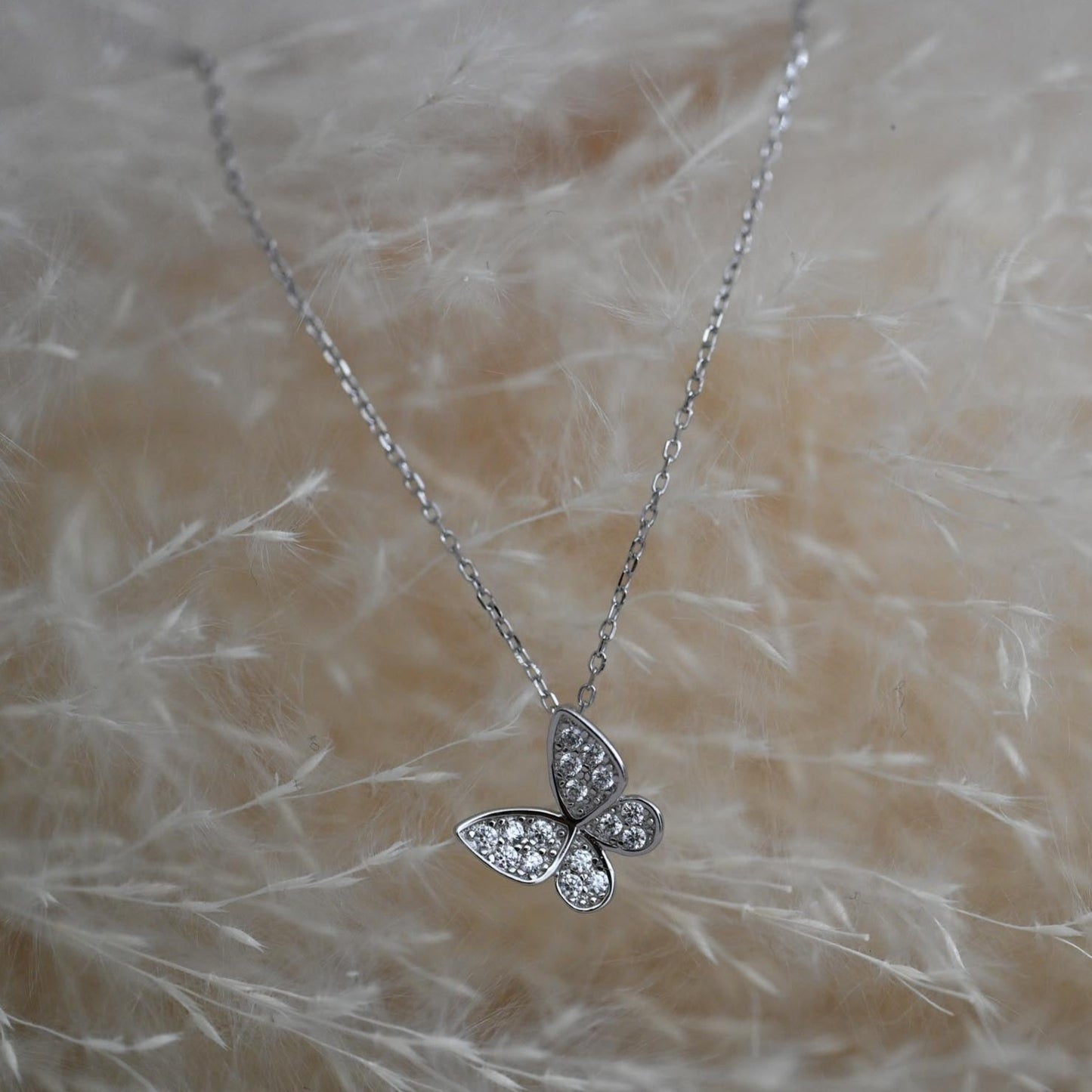 Minimalist necklace with butterfly gold