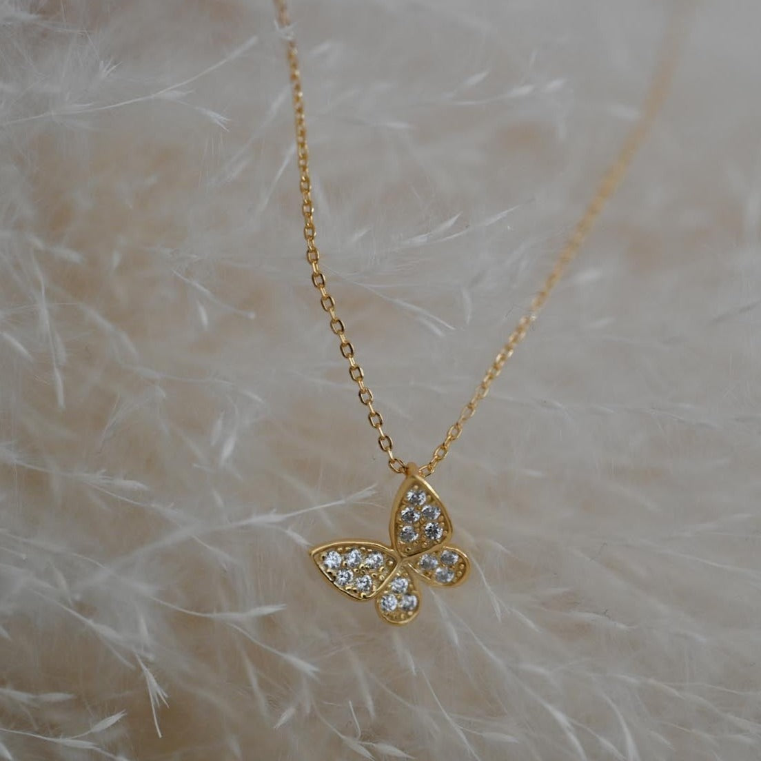 Minimalist necklace with butterfly gold