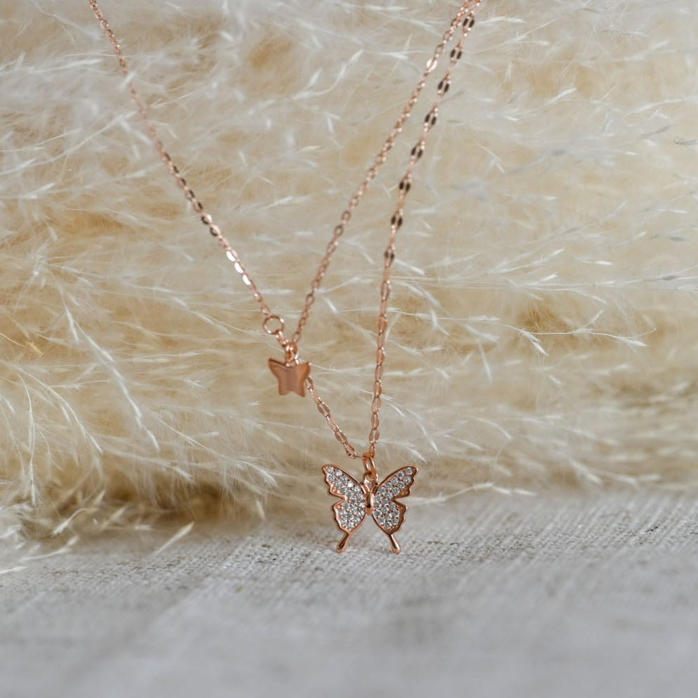 Double necklace small butterflies gold