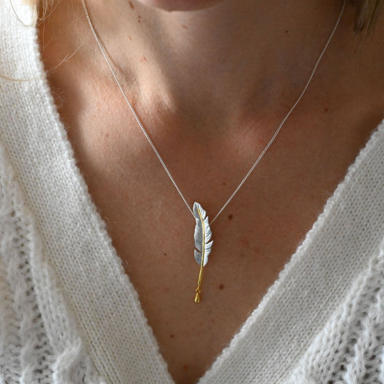 Delicate feather necklace