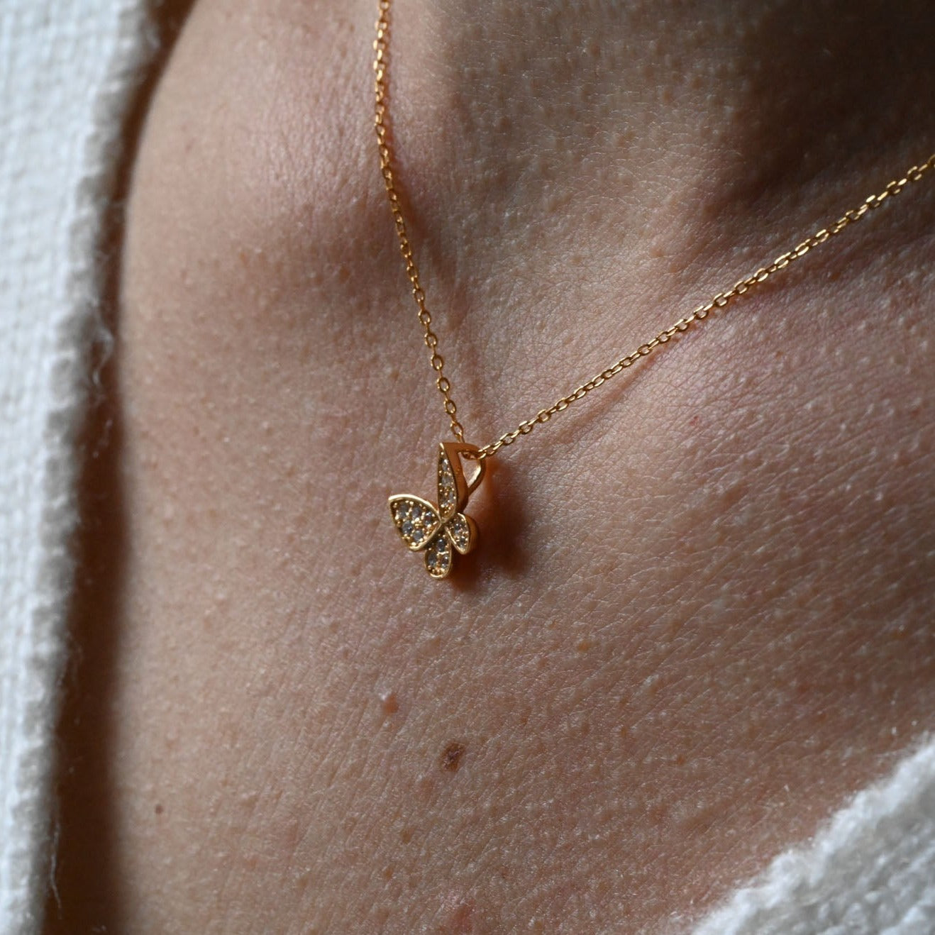 Minimalist necklace with butterfly gold