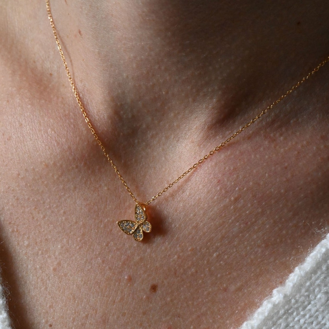 Minimalist necklace with butterfly gold