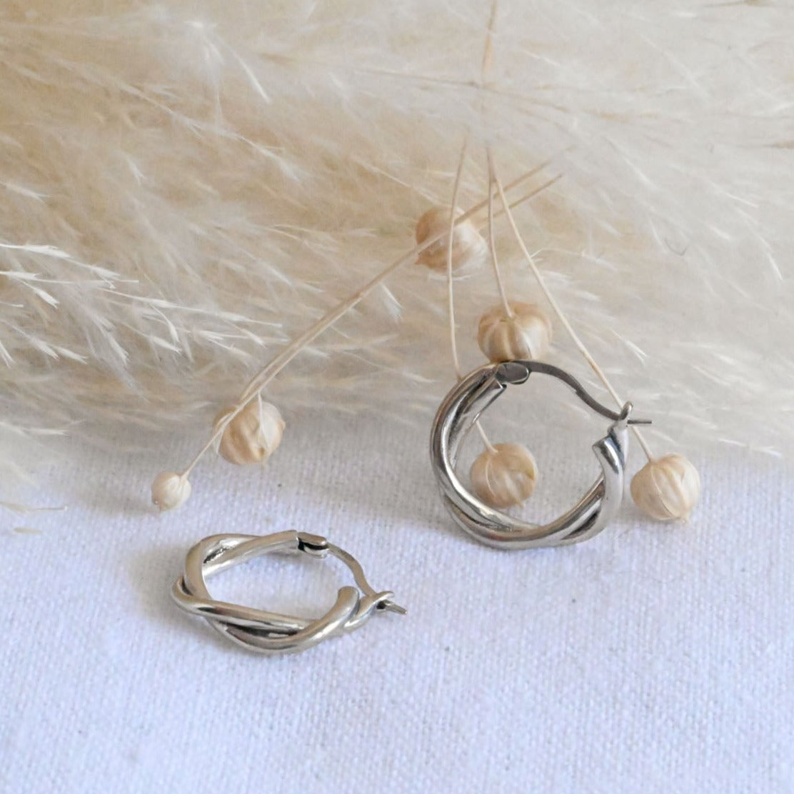Braided geometric hoop earrings gold