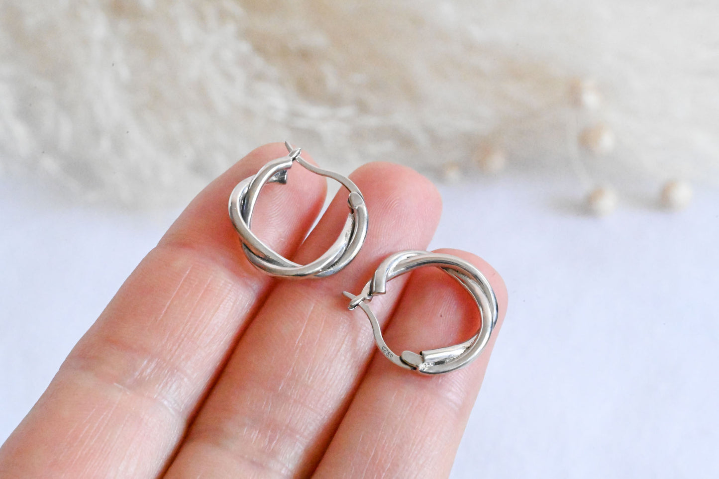 Braided geometric hoop earrings gold