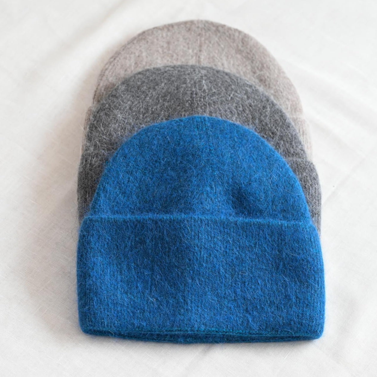 Warm, soft and fluffy hat made of merino wool and angora wool, dark grey
