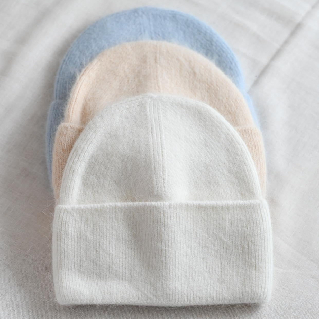 Warm, soft and fluffy hat made of merino wool and angora wool, dark grey