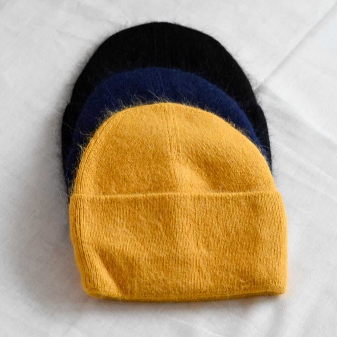 Warm, soft and fluffy hat made of merino wool and angora wool, dark grey