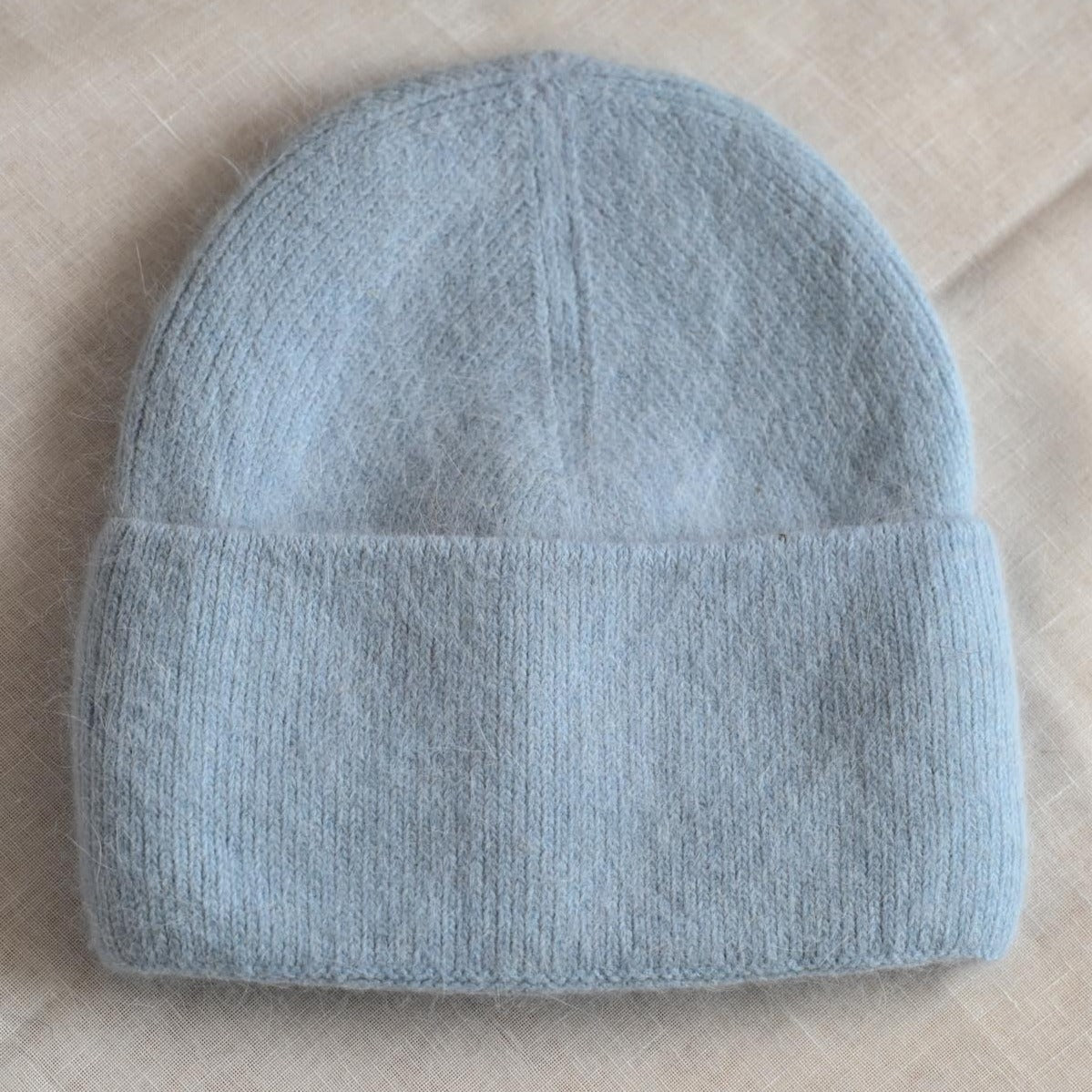 Warm, soft and fluffy hat made of merino wool and angora wool, dark grey