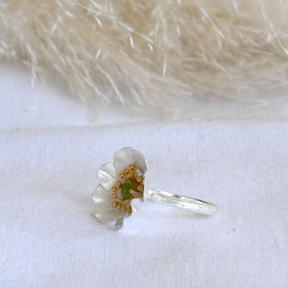 Handmade ring "Blooming Anemone" with peridot