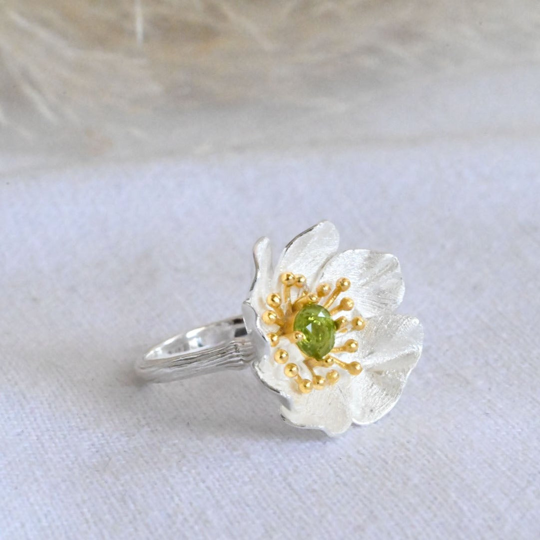 Handmade ring "Blooming Anemone" with peridot