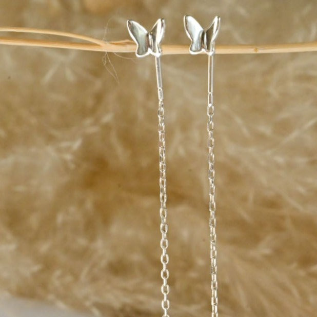 Delicate chain earrings with butterfly