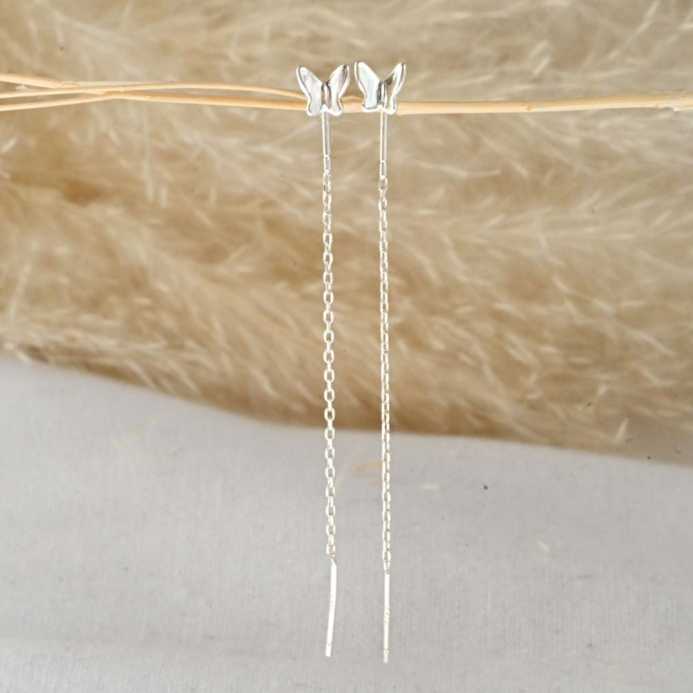 Delicate chain earrings with butterfly