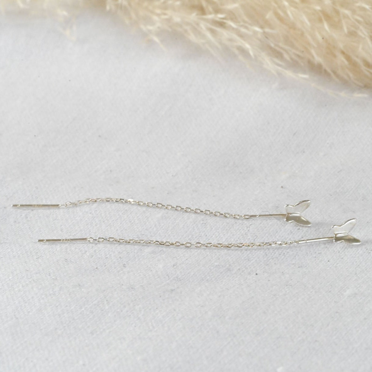 Delicate chain earrings with butterfly