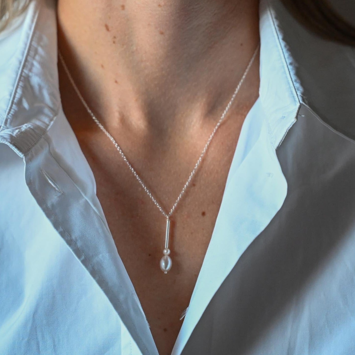 Delicate minimalist pearl necklace made of 925 sterling silver with freshwater pearls