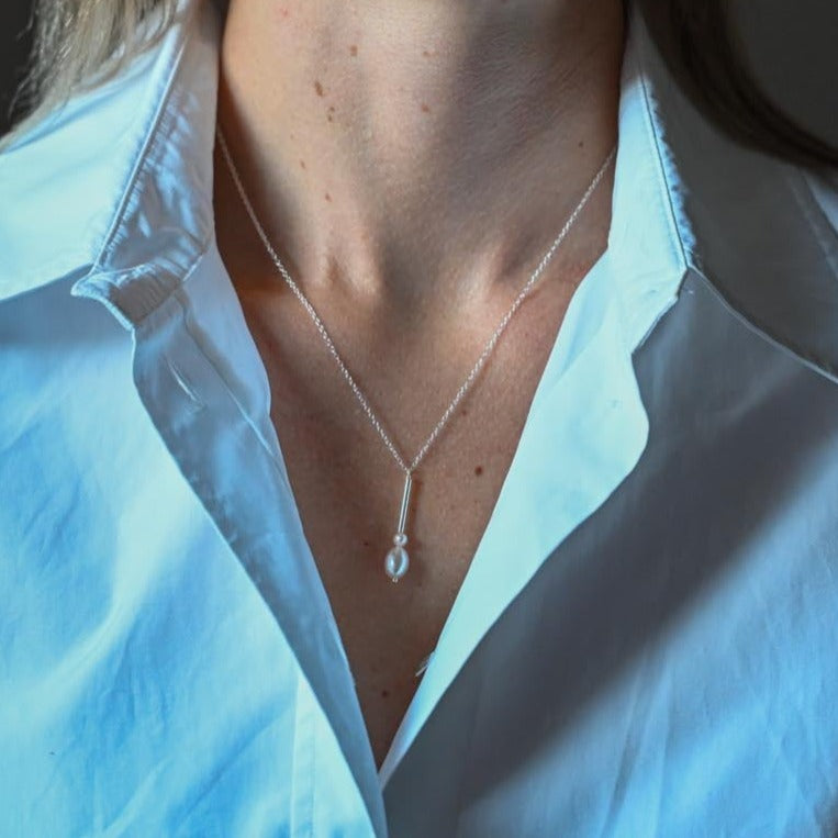 Delicate minimalist pearl necklace made of 925 sterling silver with freshwater pearls