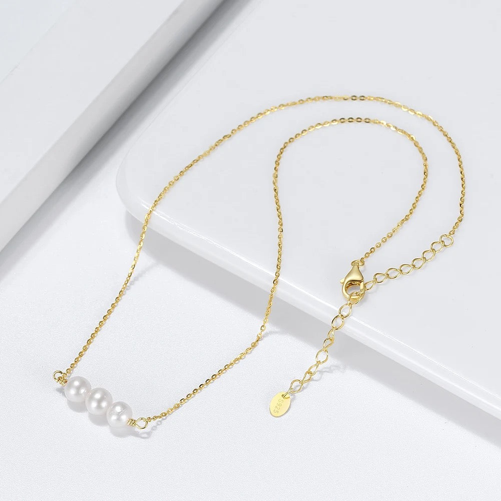 Delicate choker with three freshwater pearls on the bar, 925 silver 14K gold