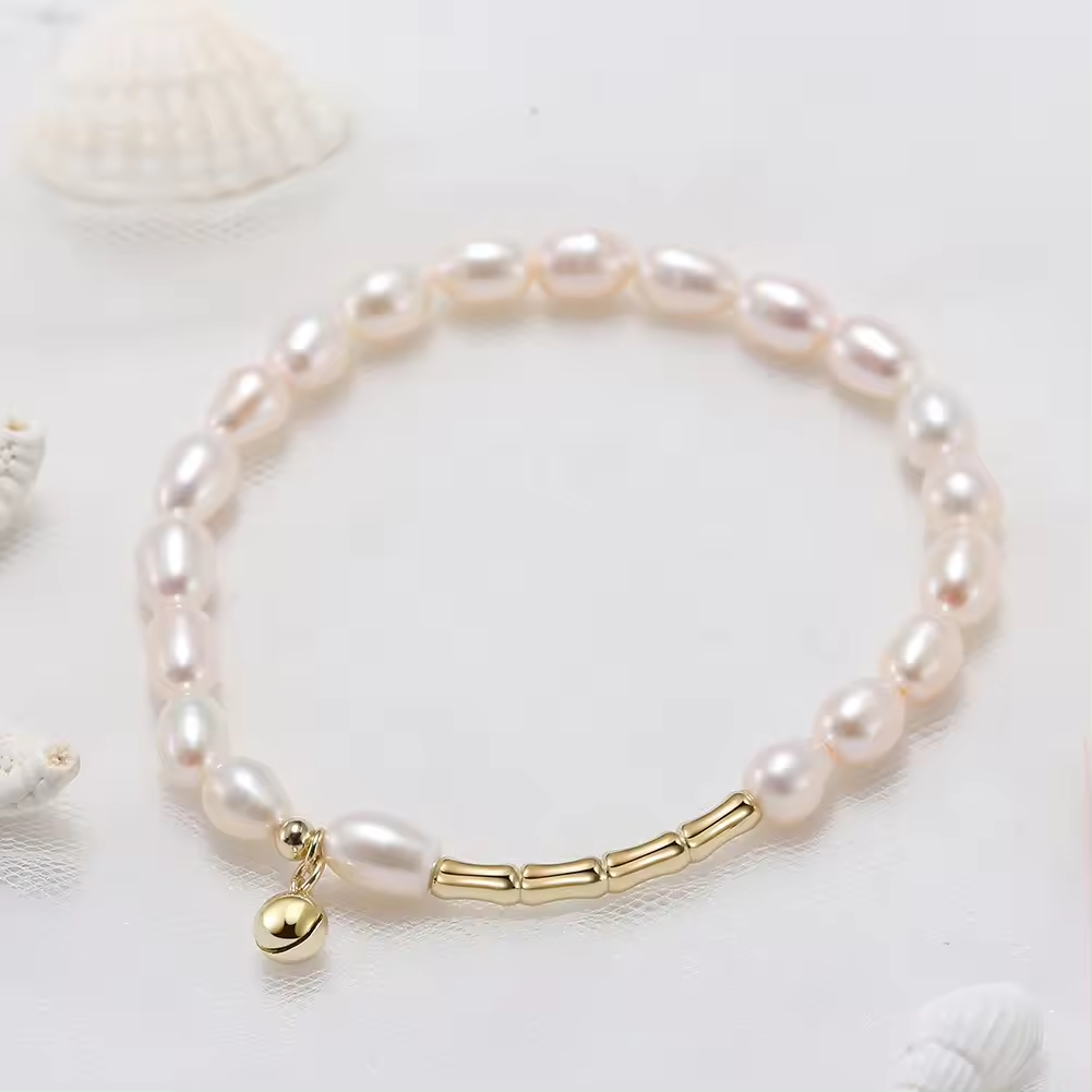 Perlenarmband mit Kügelchen Anhänger