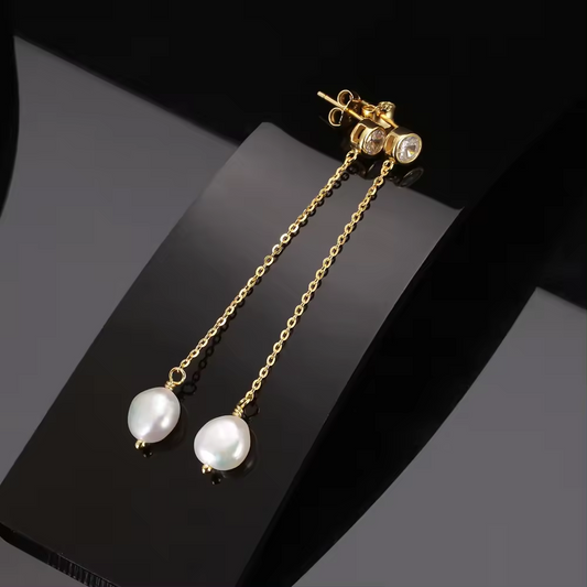 Drop earrings with zircon and pearl on a delicate chain