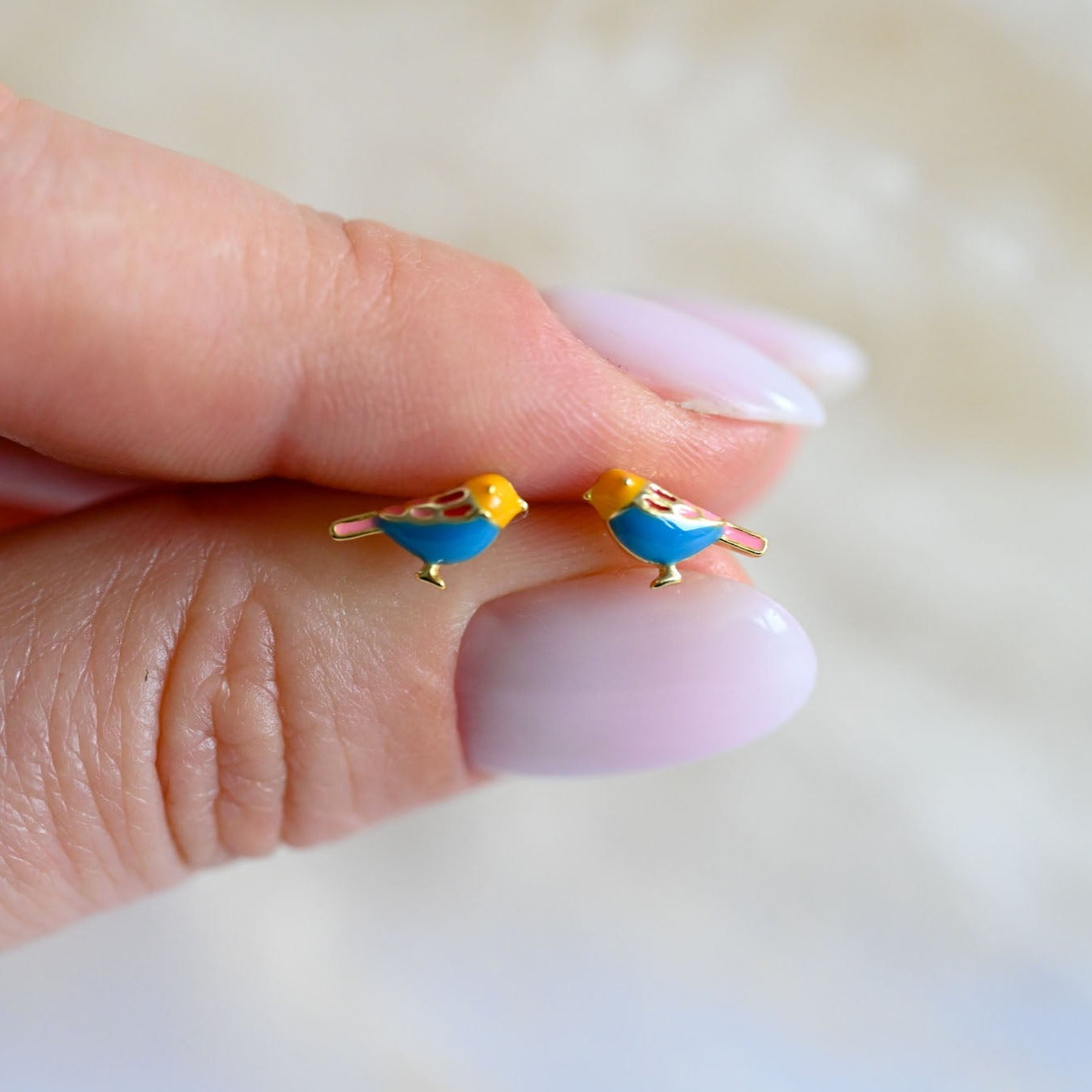 Small cute bird stud earrings