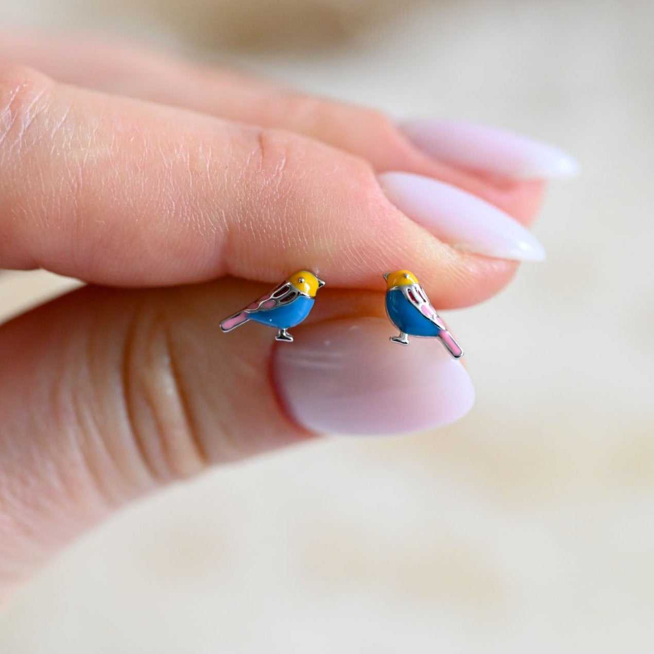 Small cute bird stud earrings