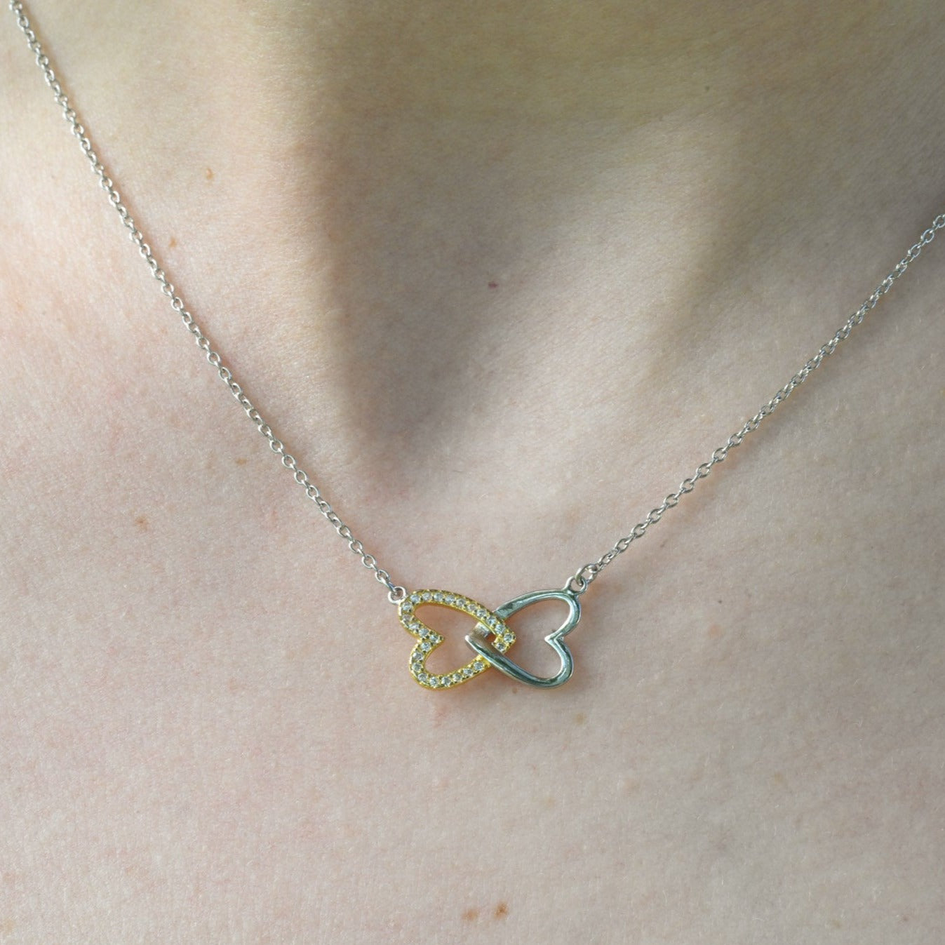 Handmade necklace "Two connected hearts"