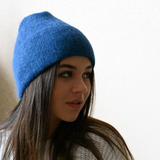 Warm, soft and fluffy hat made of merino wool and angora wool, blue