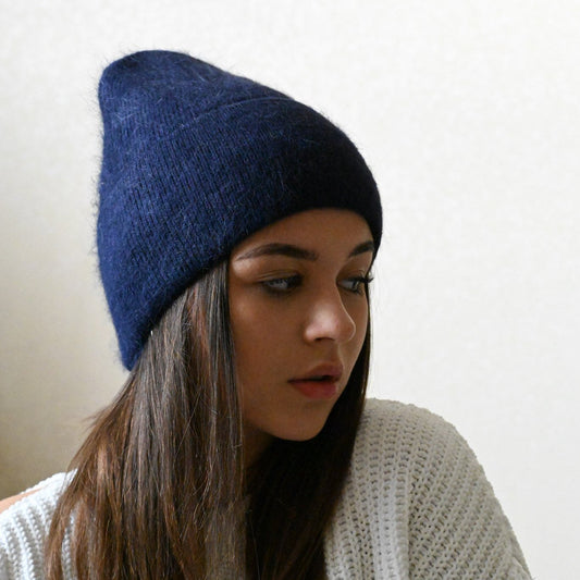 Warm, soft and fluffy hat made of merino wool and angora wool, navy blue