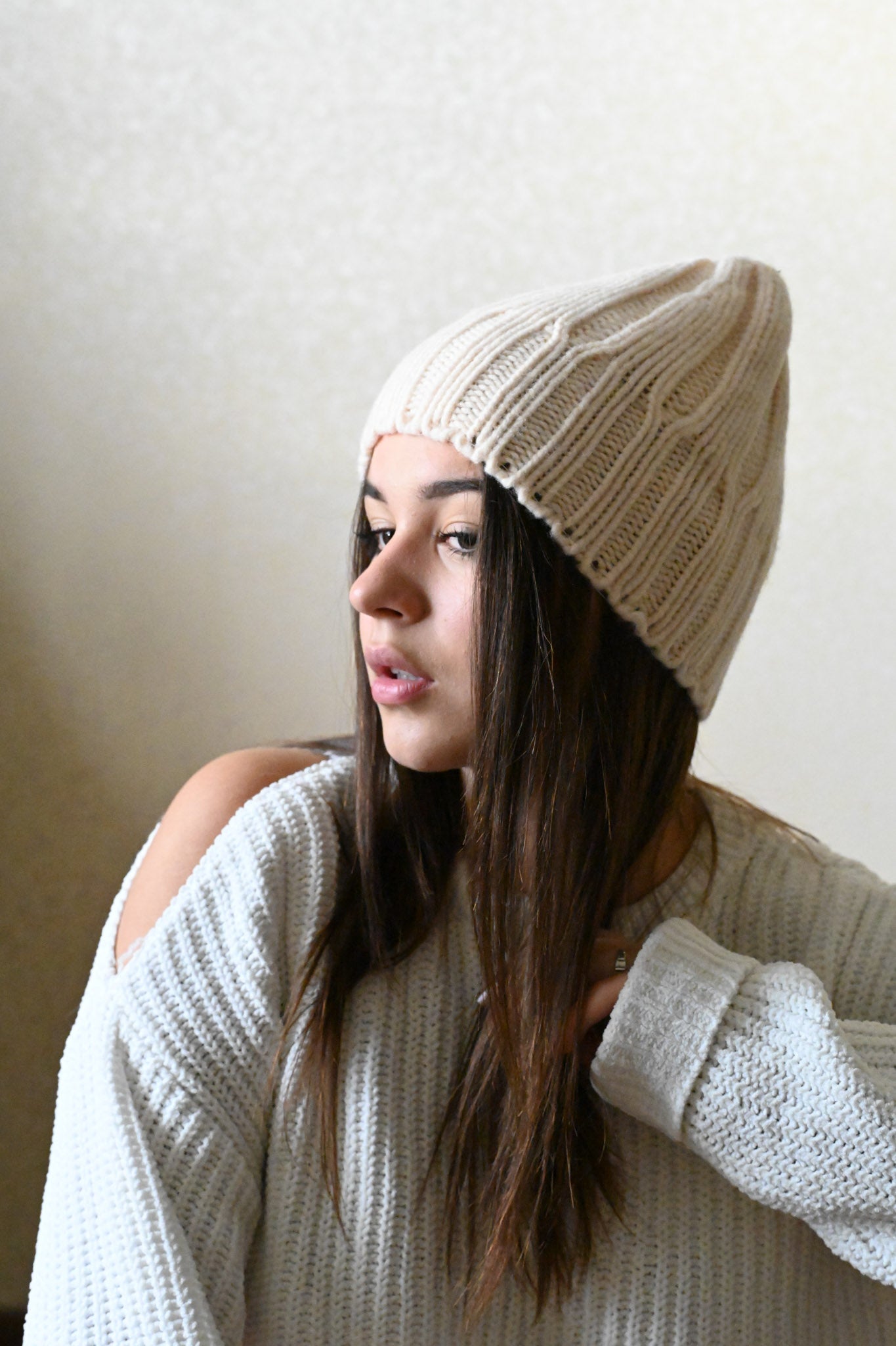 Beige winter hat on sale