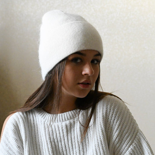 Warm, soft and fluffy hat made of merino wool and angora wool, white