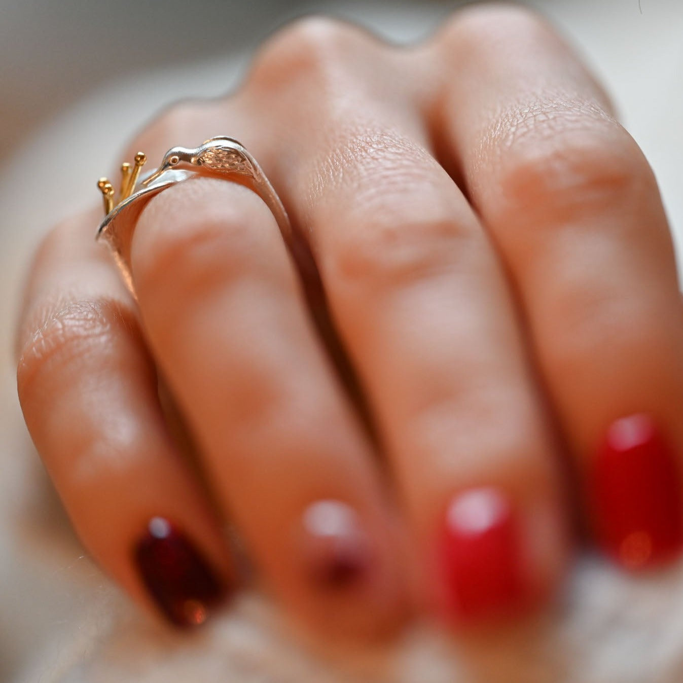 Handmade ring "Hummingbird drinking from the flower" 925 silver, 18K gold