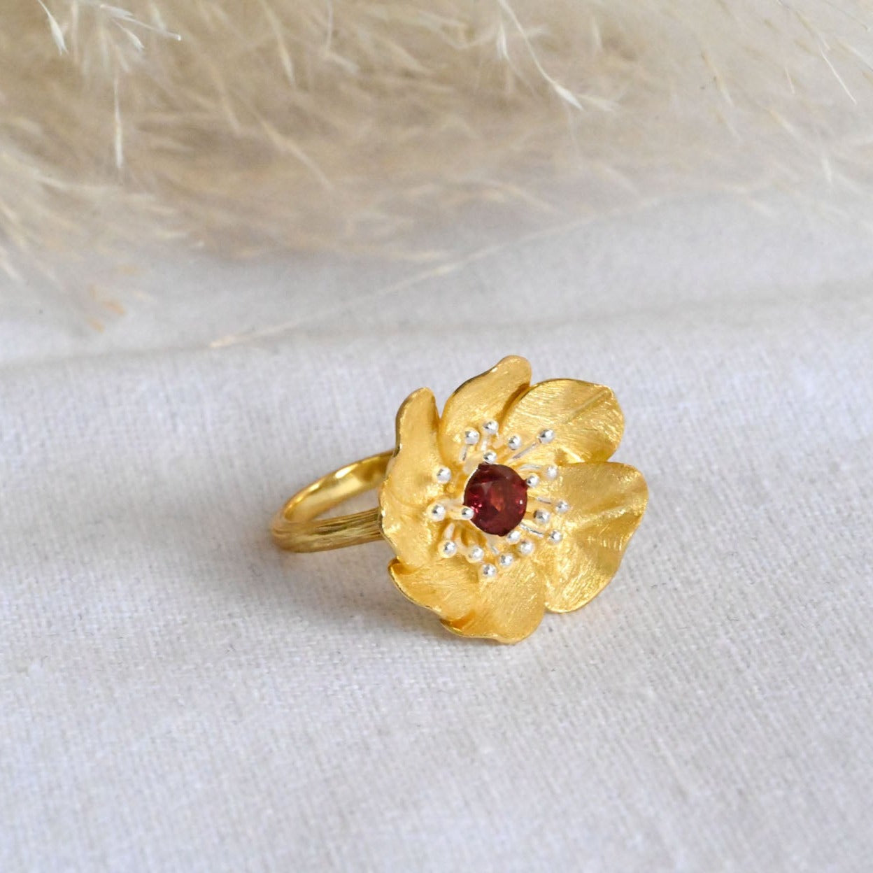 Handmade ring "Blooming Anemone" with garnet