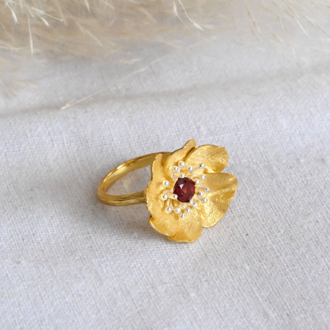 Handmade ring "Blooming Anemone" with garnet