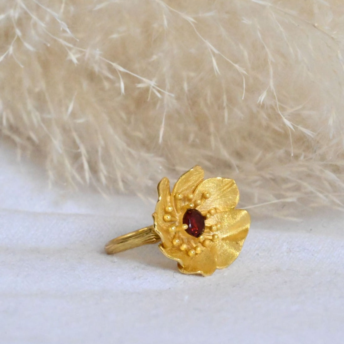 Handmade ring "Blooming Anemone" with garnet