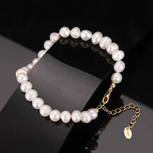 Pearl bracelet natural freshwater pearls, 925 silver, 18K gold