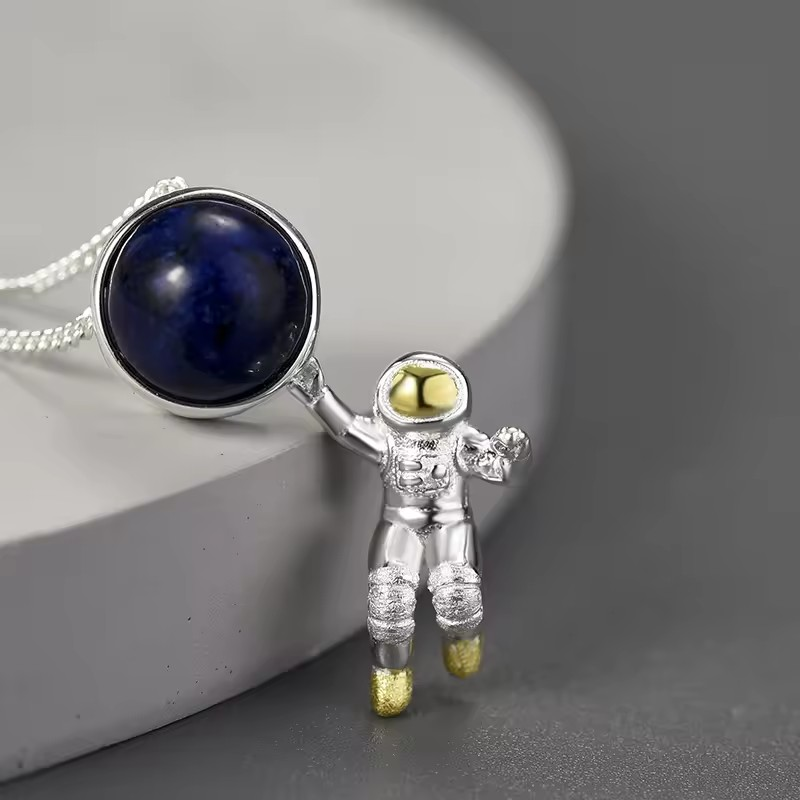 Necklace with lapis astronaut pendant