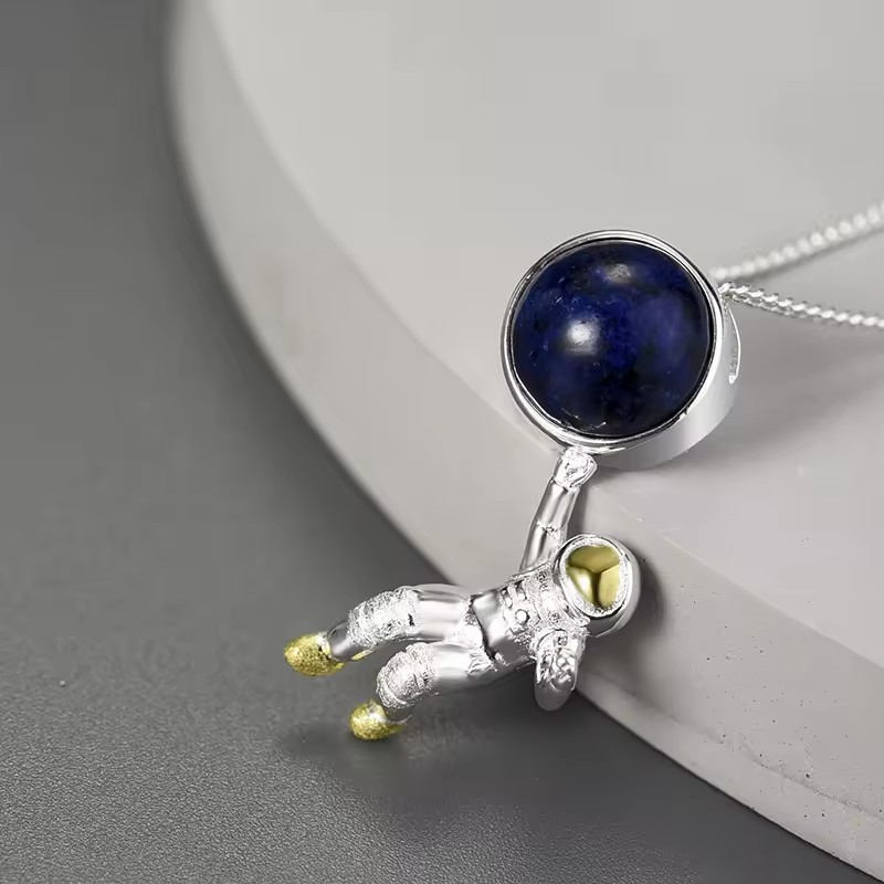 Necklace with lapis astronaut pendant