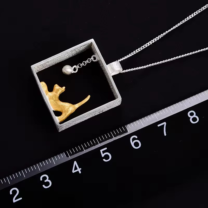 Necklace with pendant "Cat playing with ball", 925 silver, 18K gold