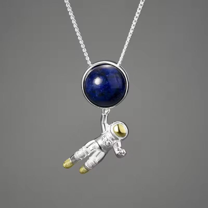 Necklace with lapis astronaut pendant